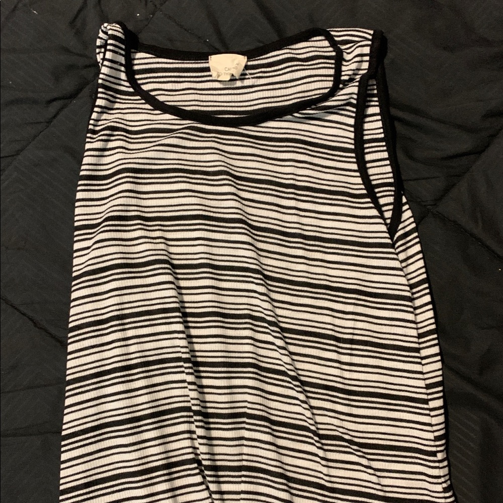 Tank top with knot at the bottom.